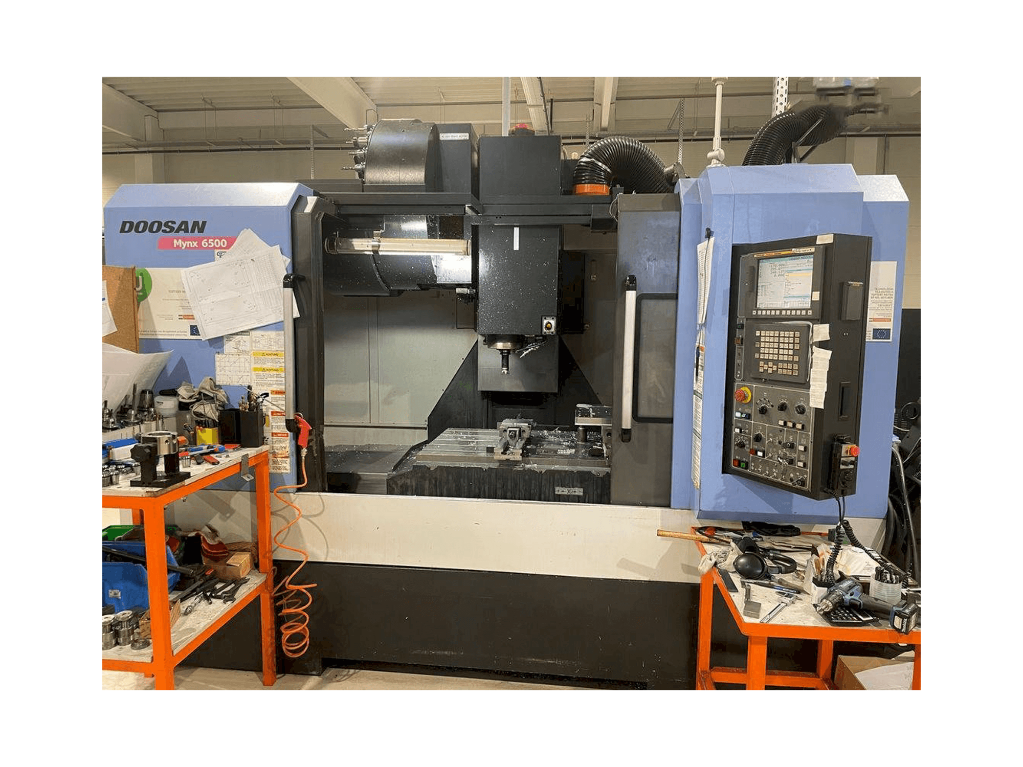 Masina Doosan MYNX DNM 6500 eestvaade