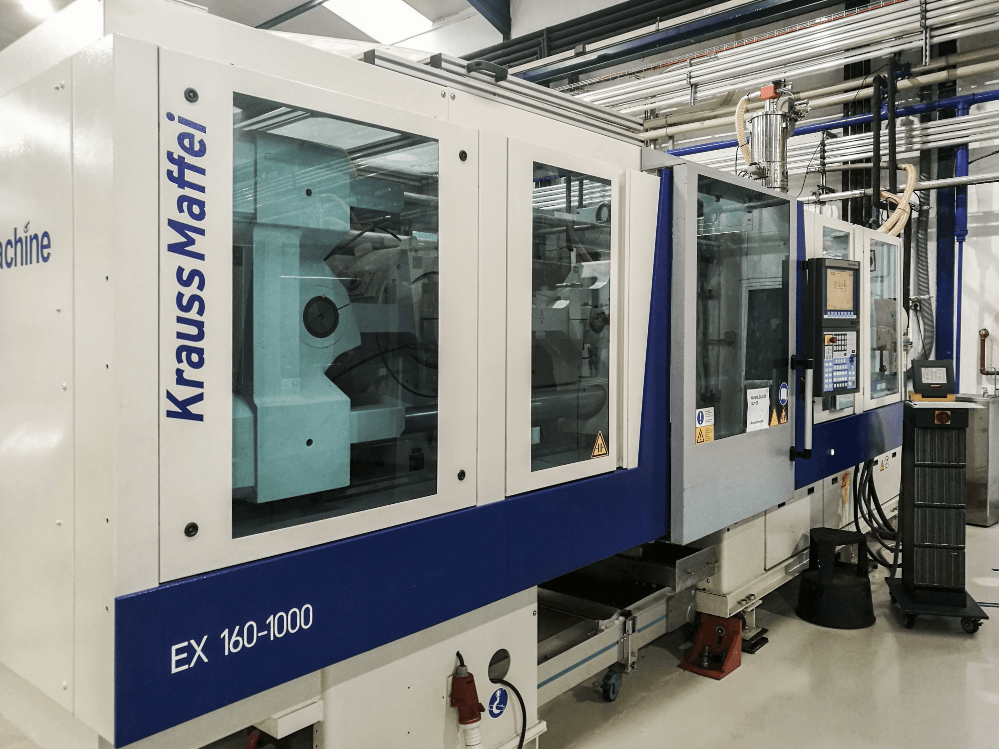 Masinavaade Krauss Maffei 160-1000 EX vasakult