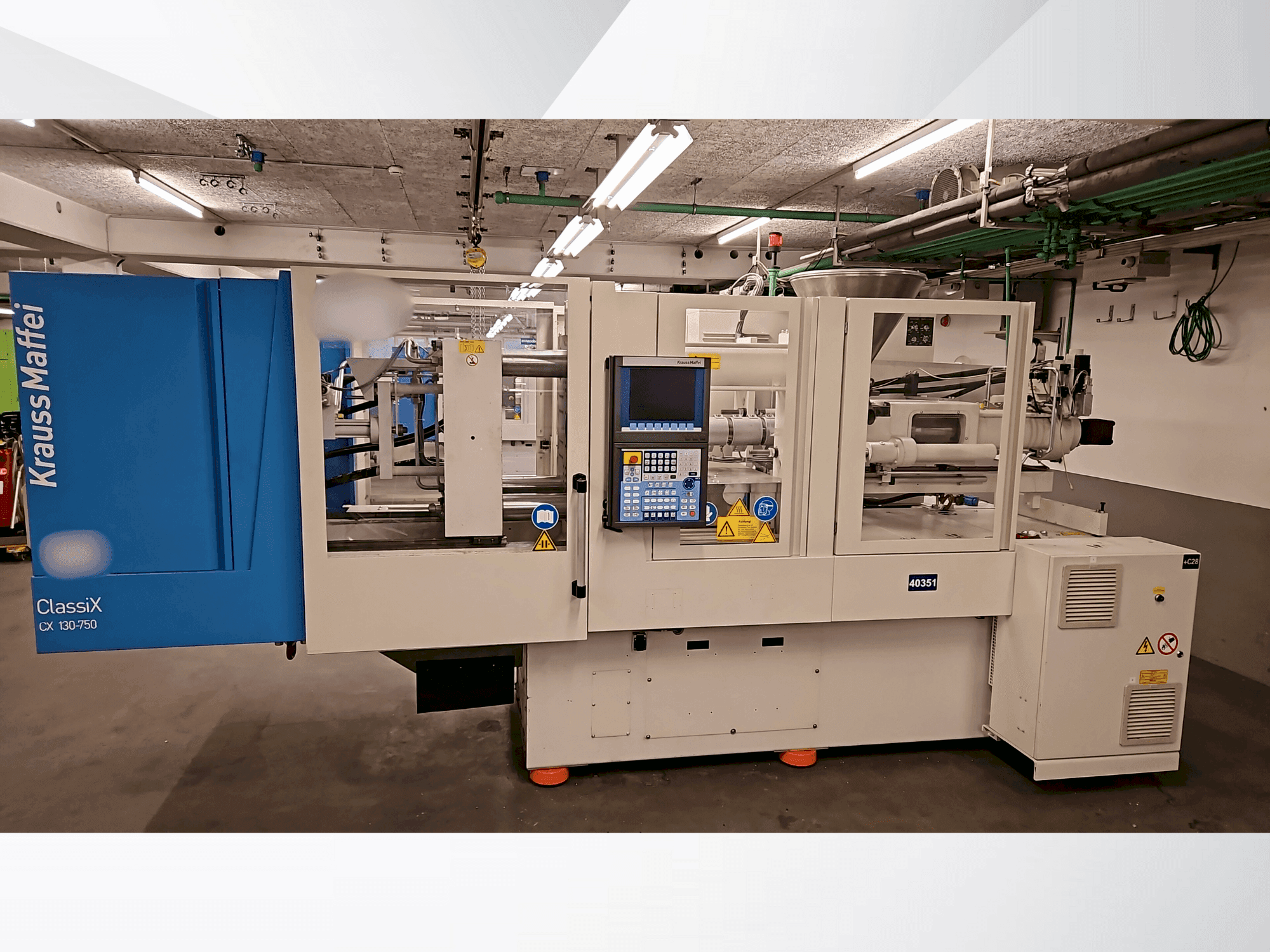 Masina Krauss Maffei 130-750 CX eestvaade