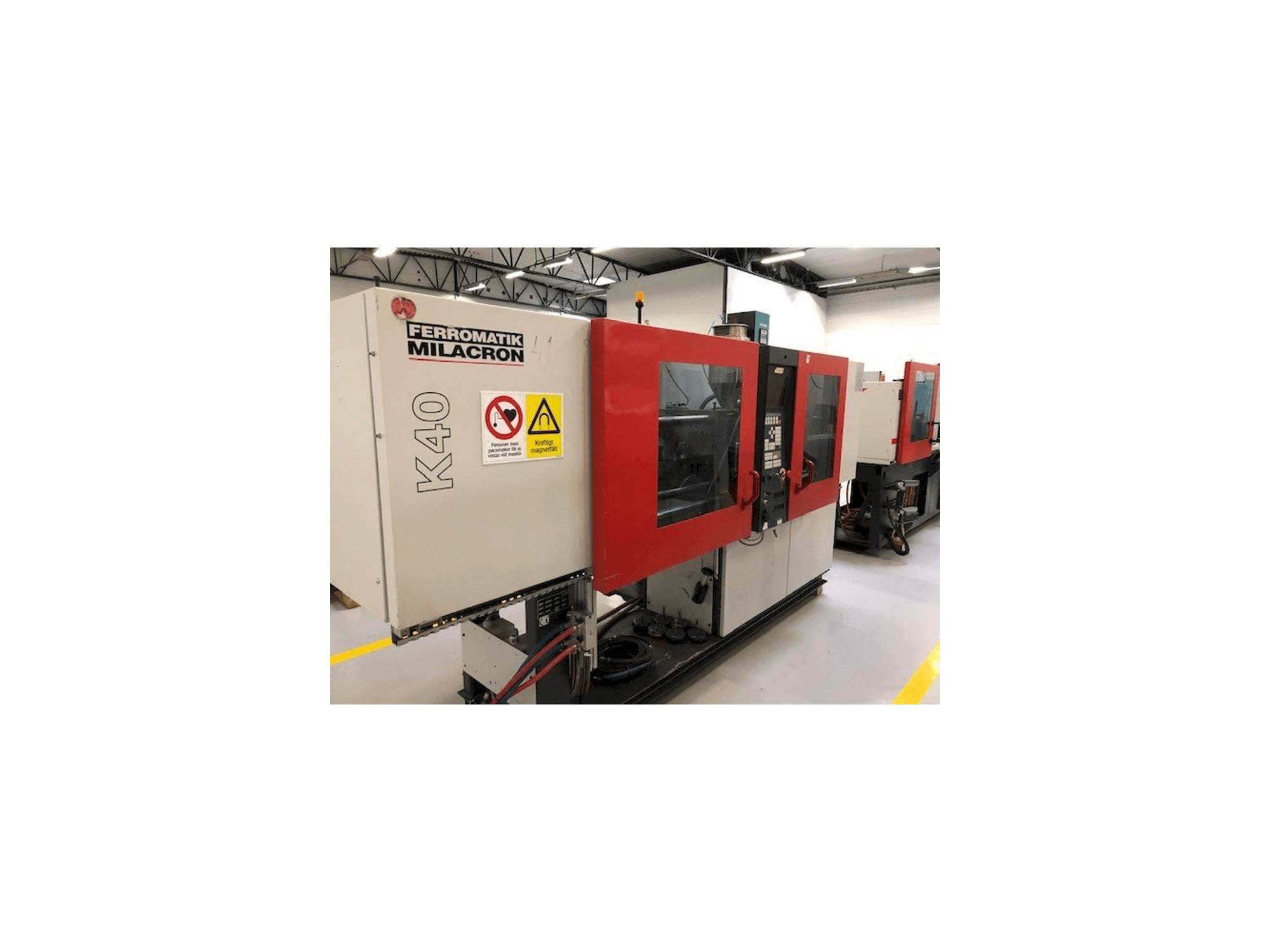Masina FERROMATIK MILACRON K40 D-E vasaku külje vaade