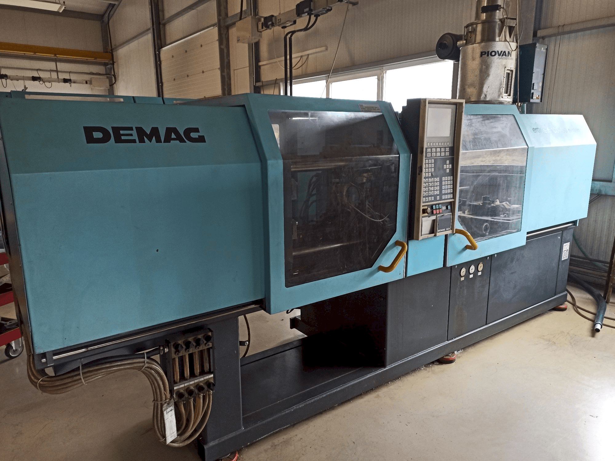Masina DEMAG Ergotech 150-610 Compact vasaku külje vaade