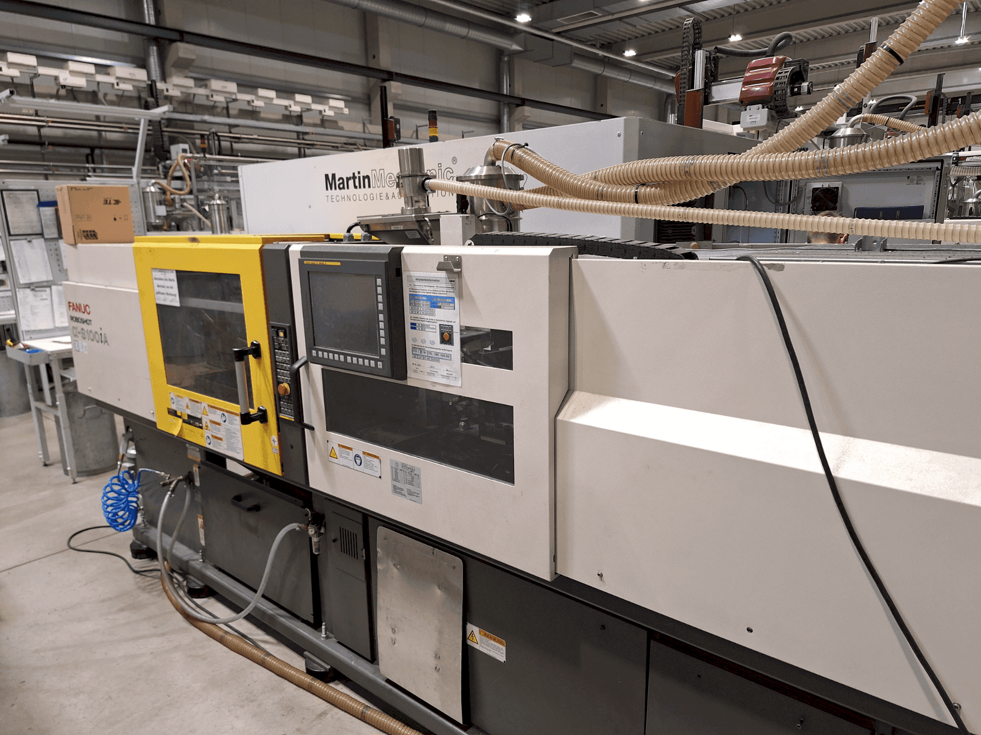 Masina FANUC Roboshot S100iA eestvaade