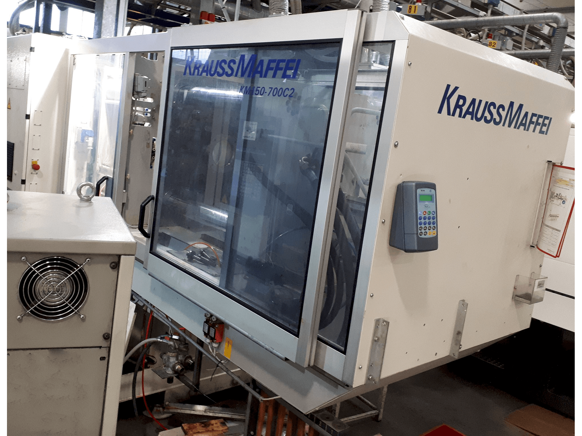 Masinavaade Krauss Maffei C2 150-700 paremalt