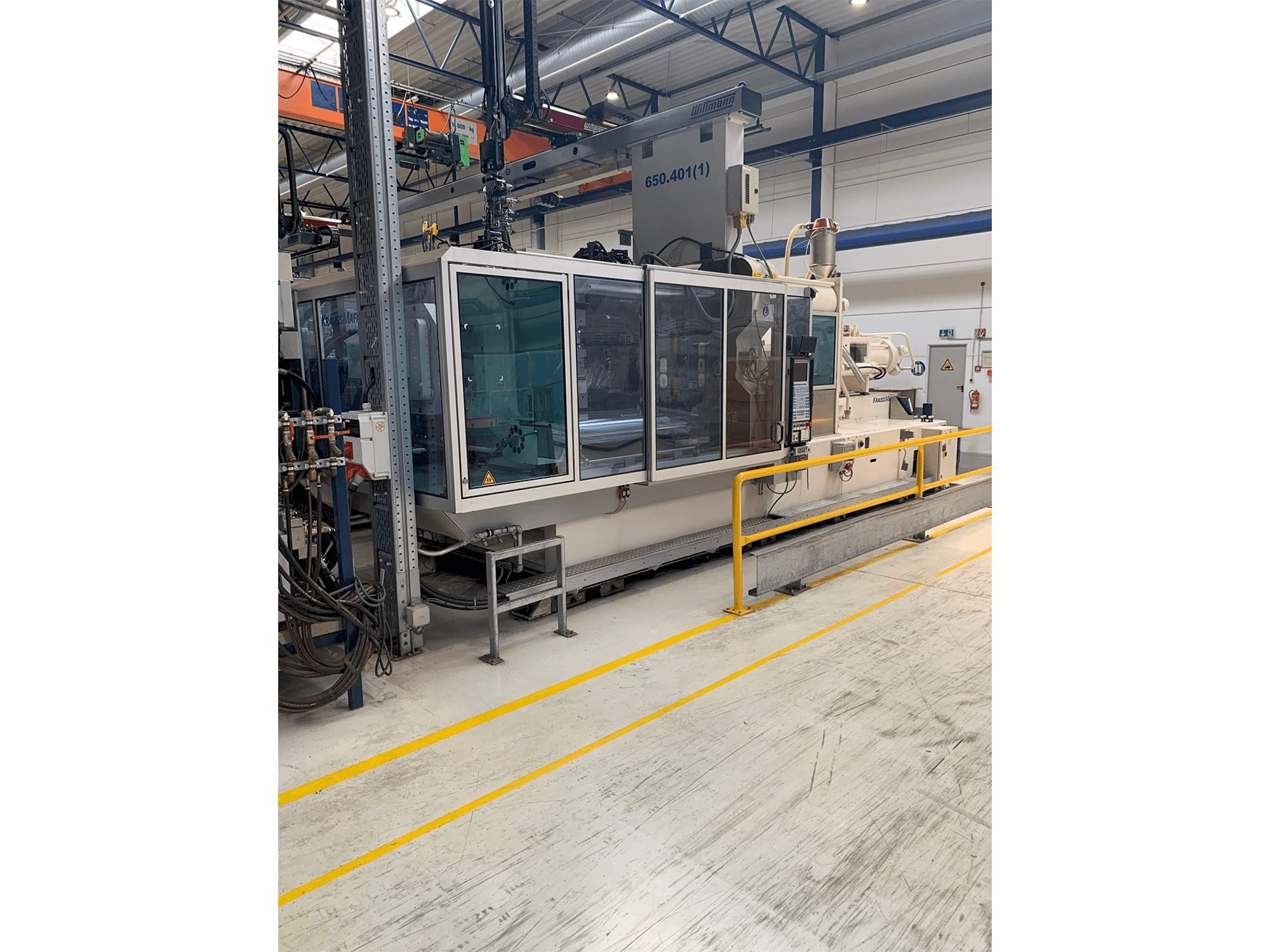 Masina Krauss Maffei 650-2700-520 CL eestvaade