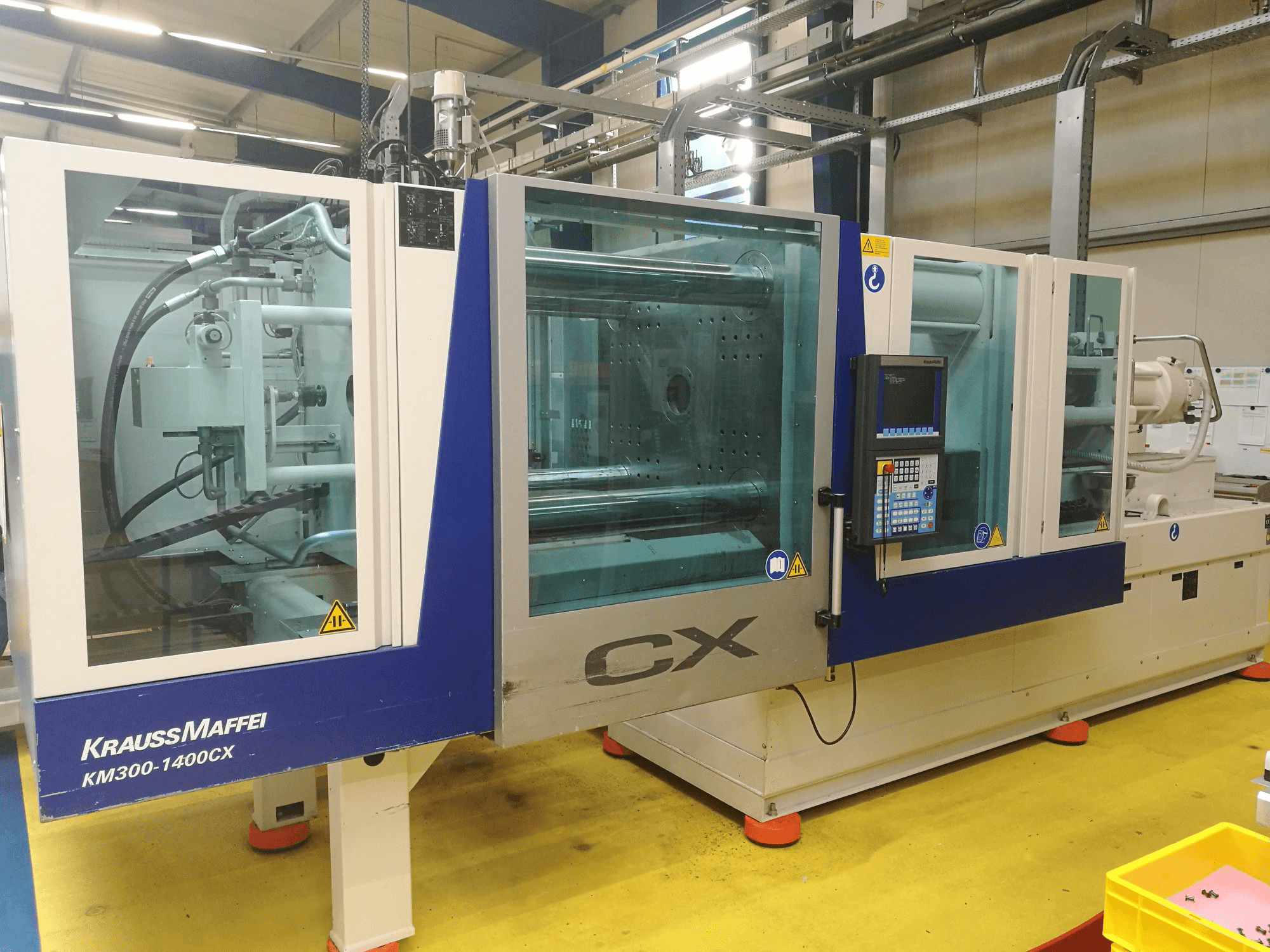 Masina Krauss Maffei 300-1400 CX eestvaade
