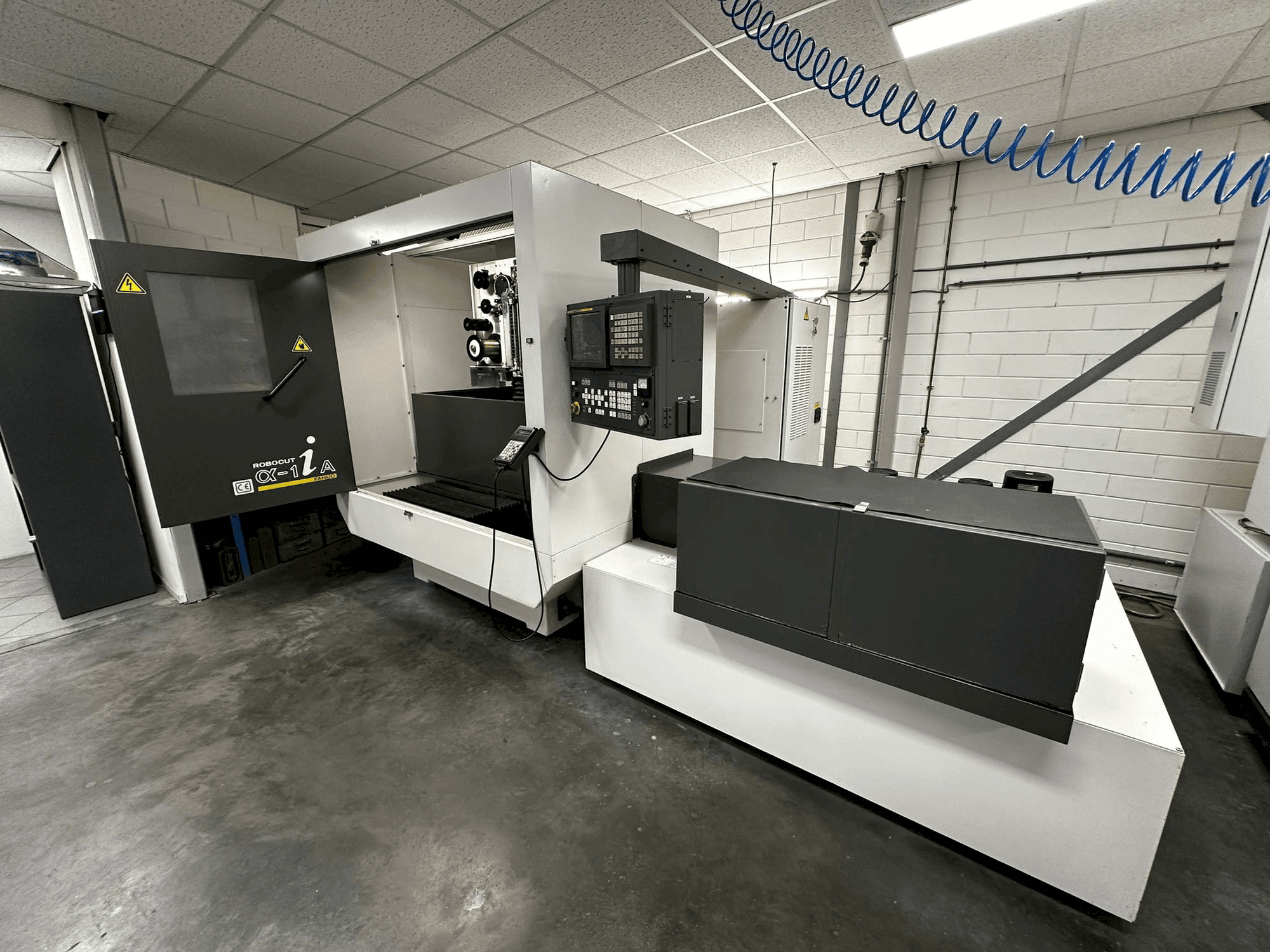 Masina FANUC Robocut α-1iA eestvaade