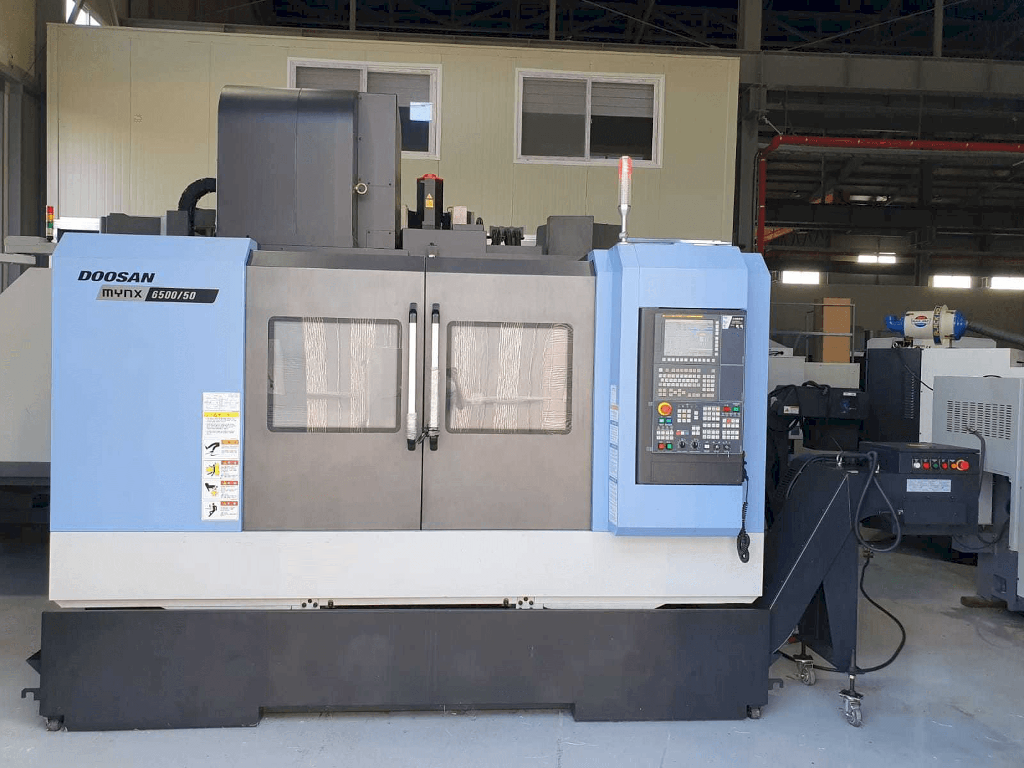 Masina Doosan Mynx 6500/50 eestvaade