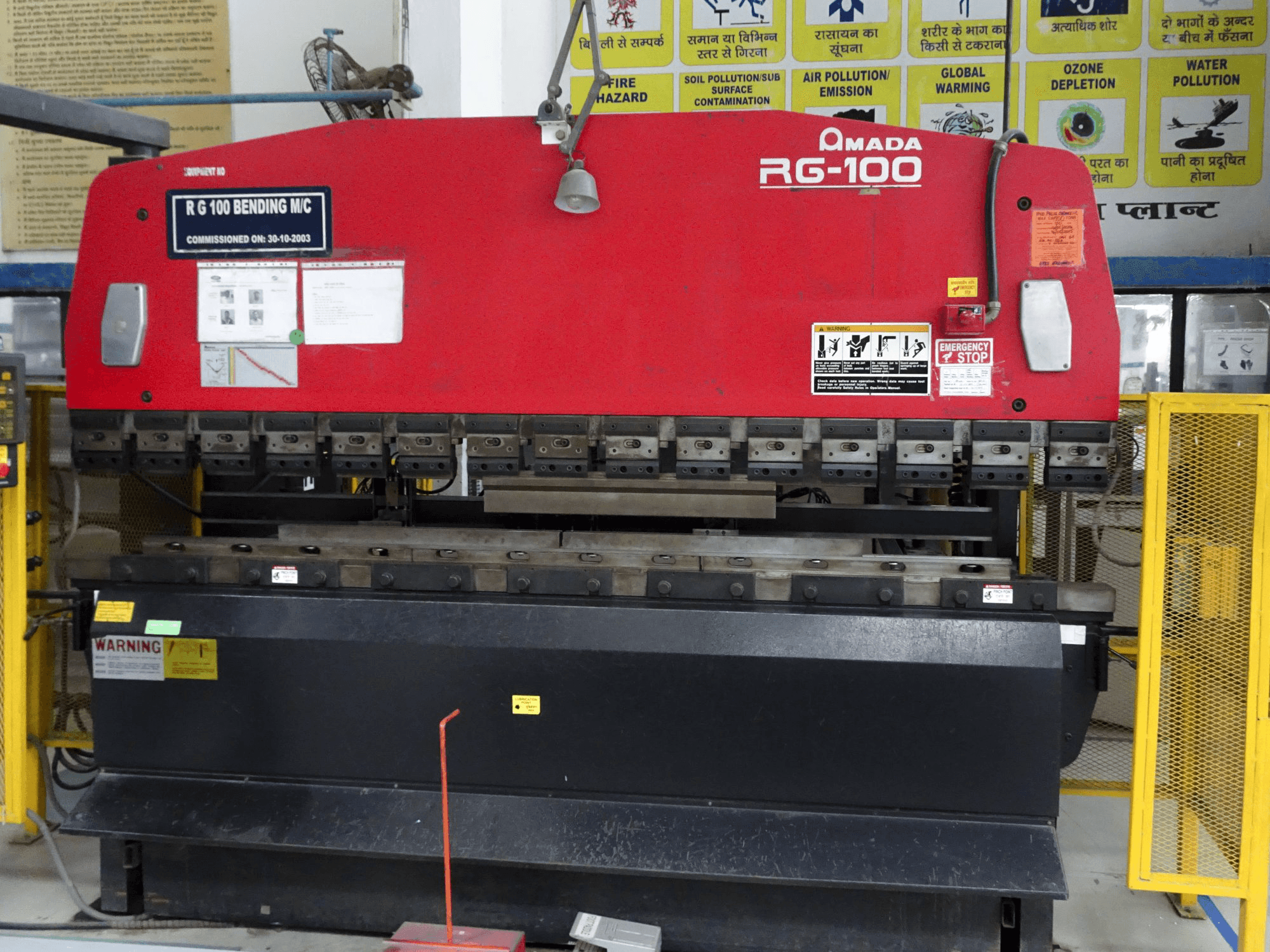 Front view of AMADA RG-100 machine