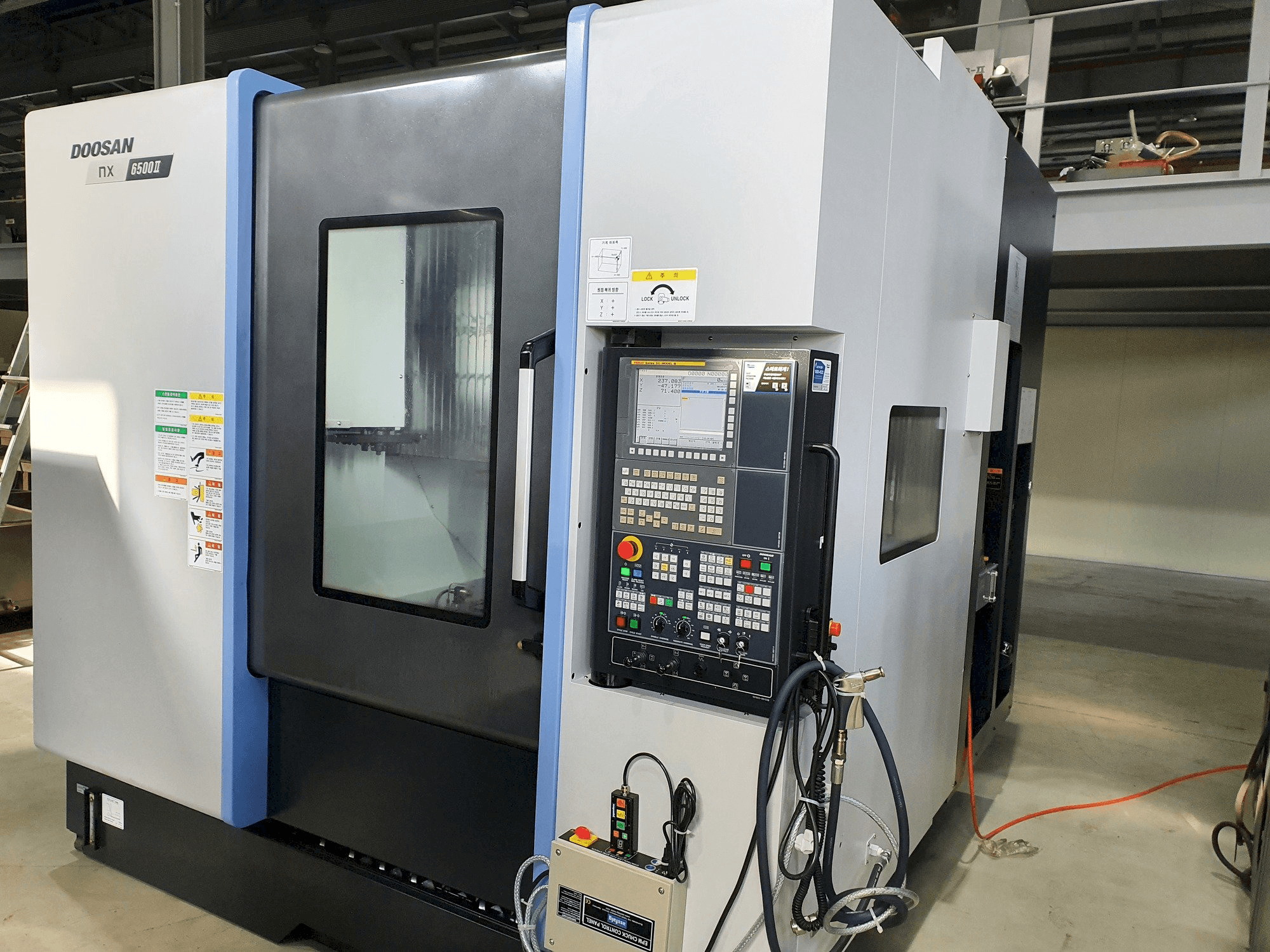 Masina Doosan NX6500Ⅱ eestvaade