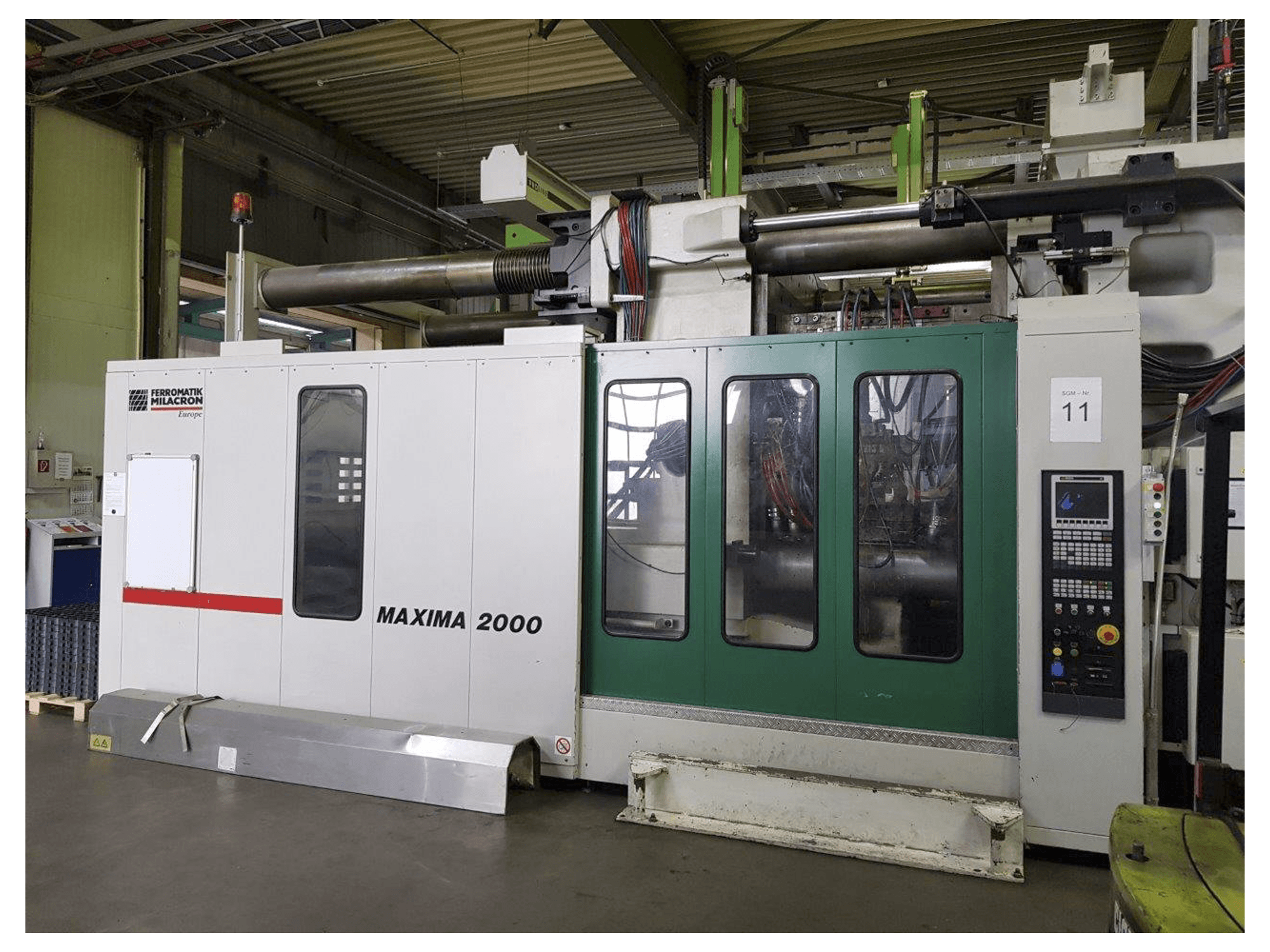 Masinavaade FERROMATIK MILACRON MM 2000 paremalt