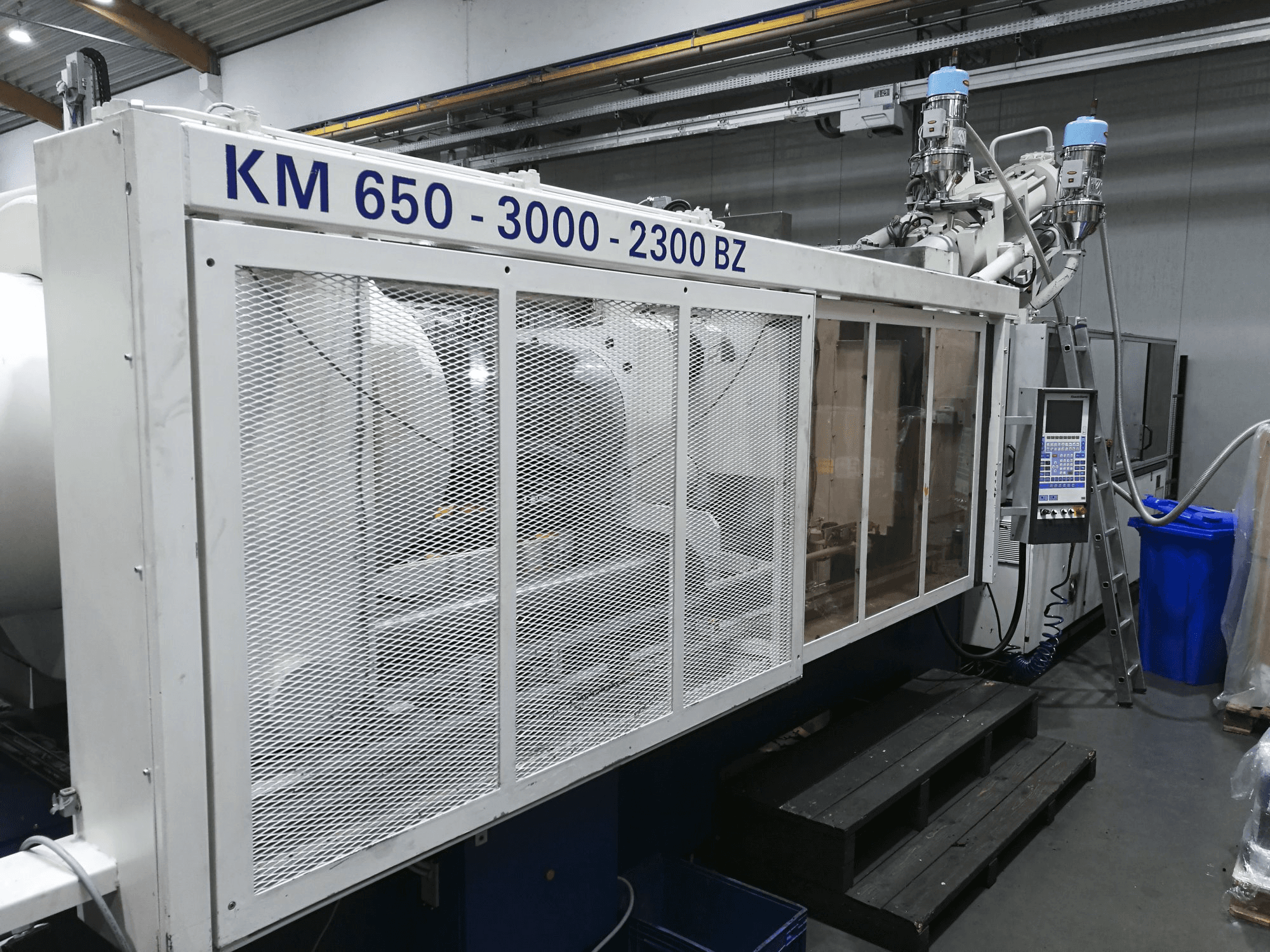 Masinavaade Krauss Maffei 650-3000-2300 BZ vasakult