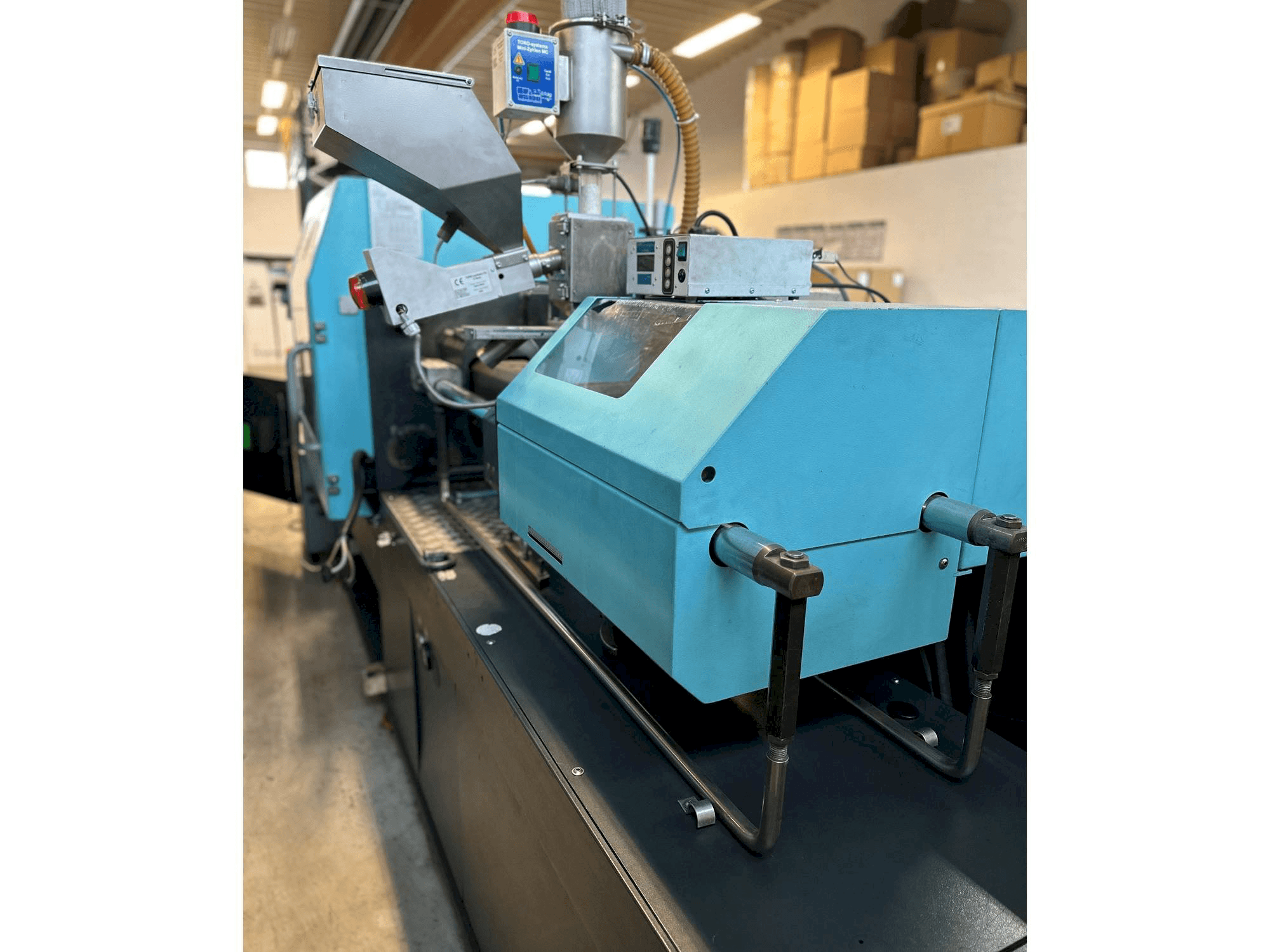 Masina DEMAG Concept 80/370-120 eestvaade