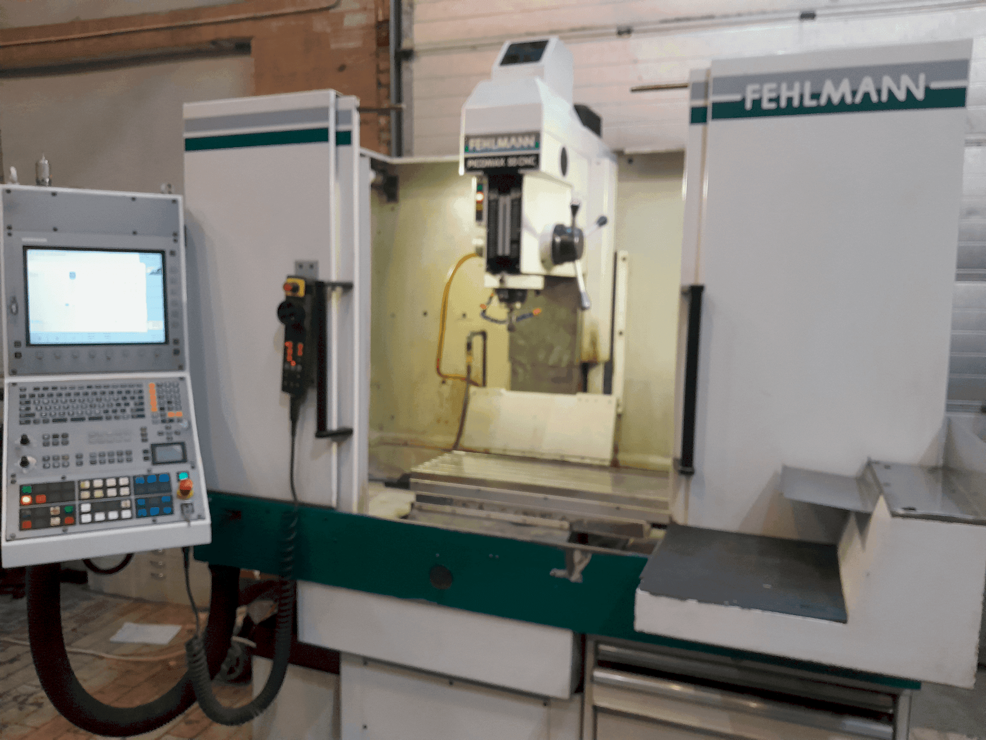 Masina FEHLMANN PICOMAX 55 CNC 2/3 eestvaade