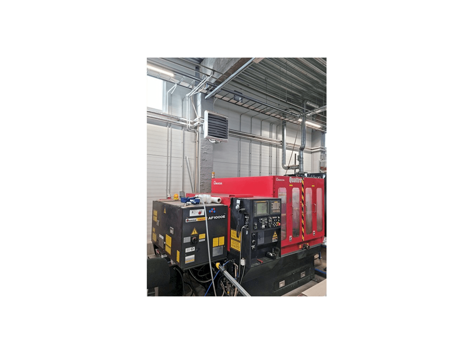 Masina AMADA Quattro vasaku külje vaade