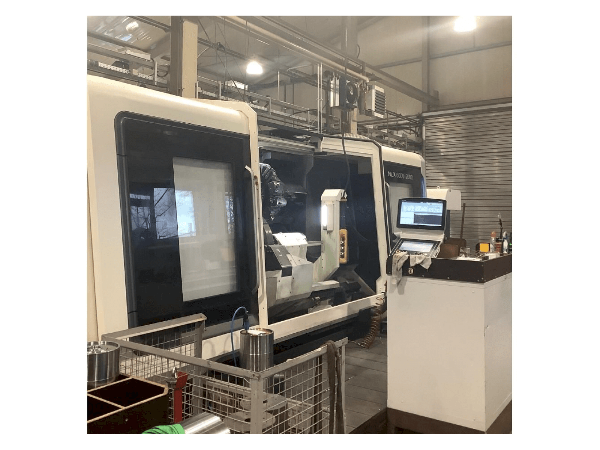 Masina DMG MORI NLX 6000 | 2000 eestvaade