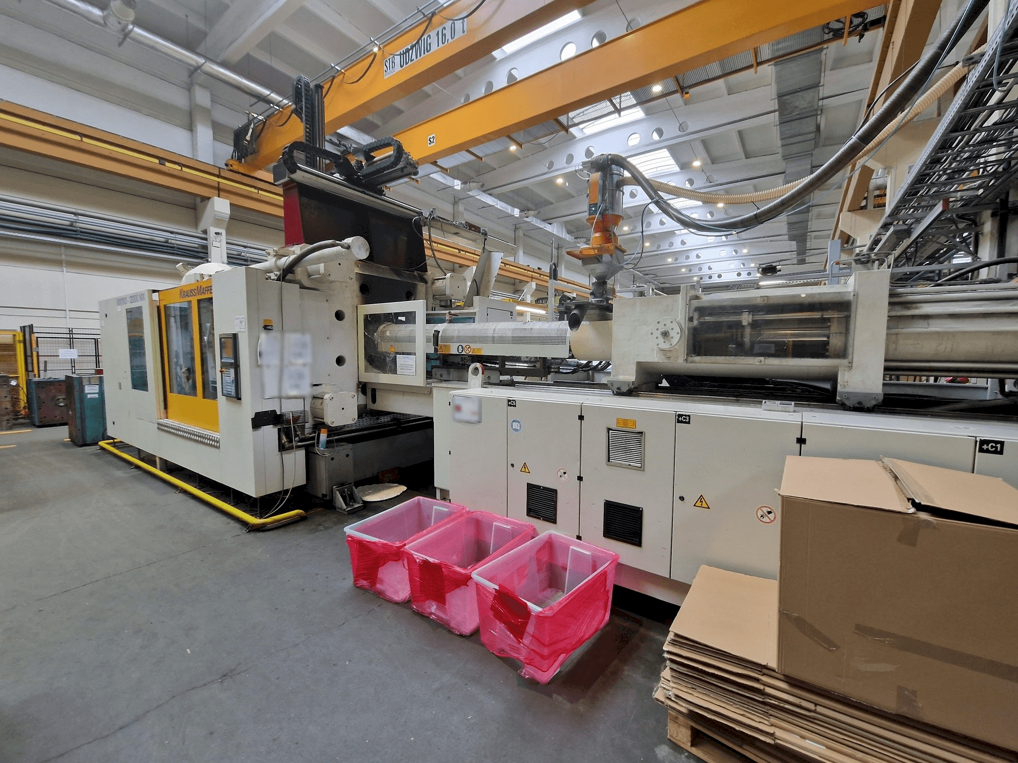 Masina Krauss Maffei 1100-12000 MX eestvaade