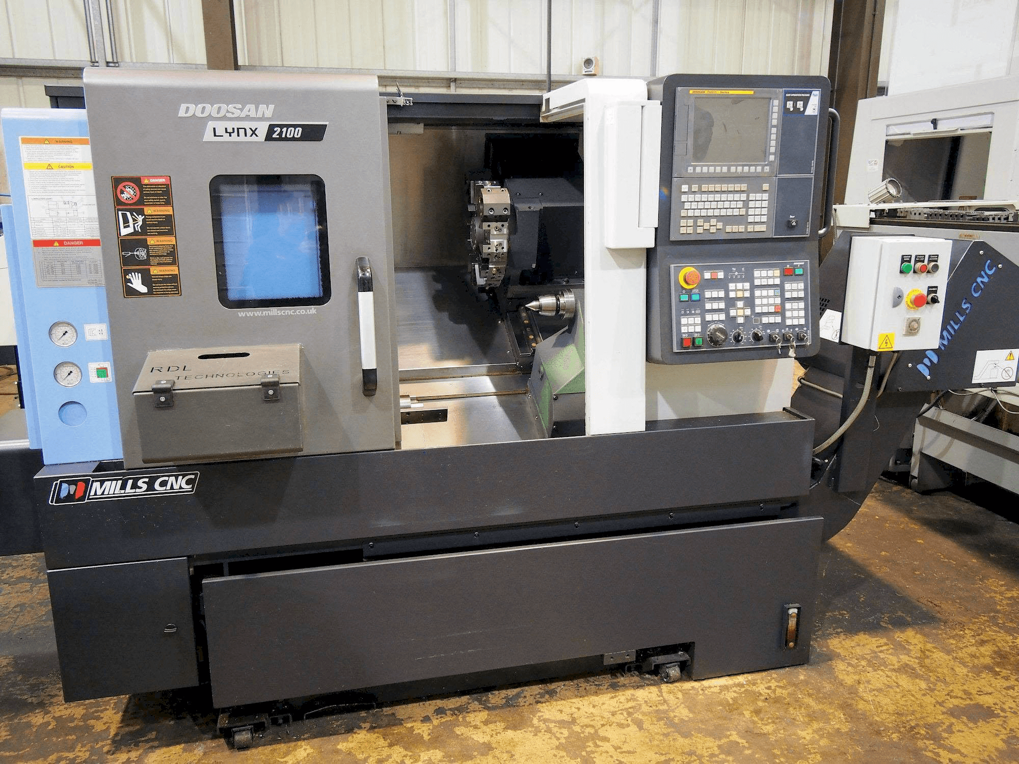 Masina Doosan Lynx 2100B eestvaade