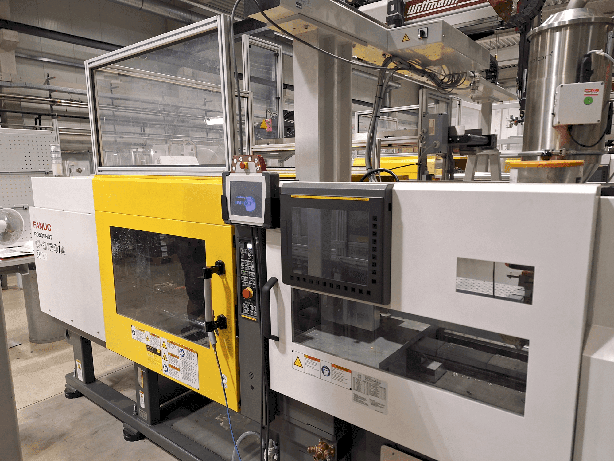 Masina FANUC Roboshot S130iA eestvaade