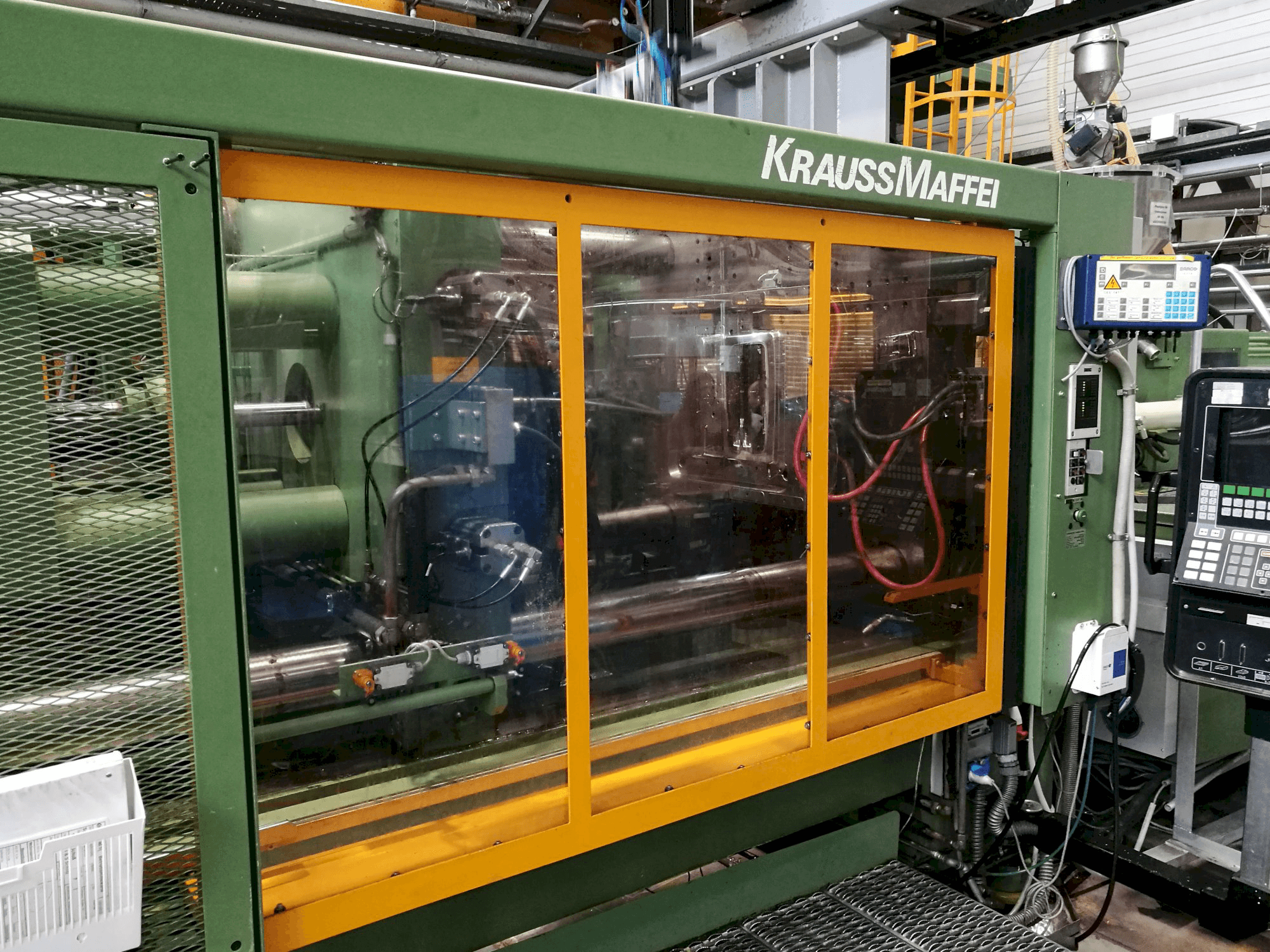 Masinavaade Krauss Maffei 650-2300 B2 vasakult