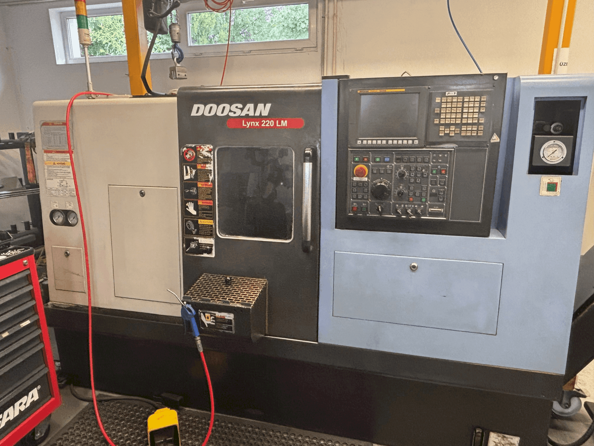 Masina DOOSAN LYNX 200 LM eestvaade