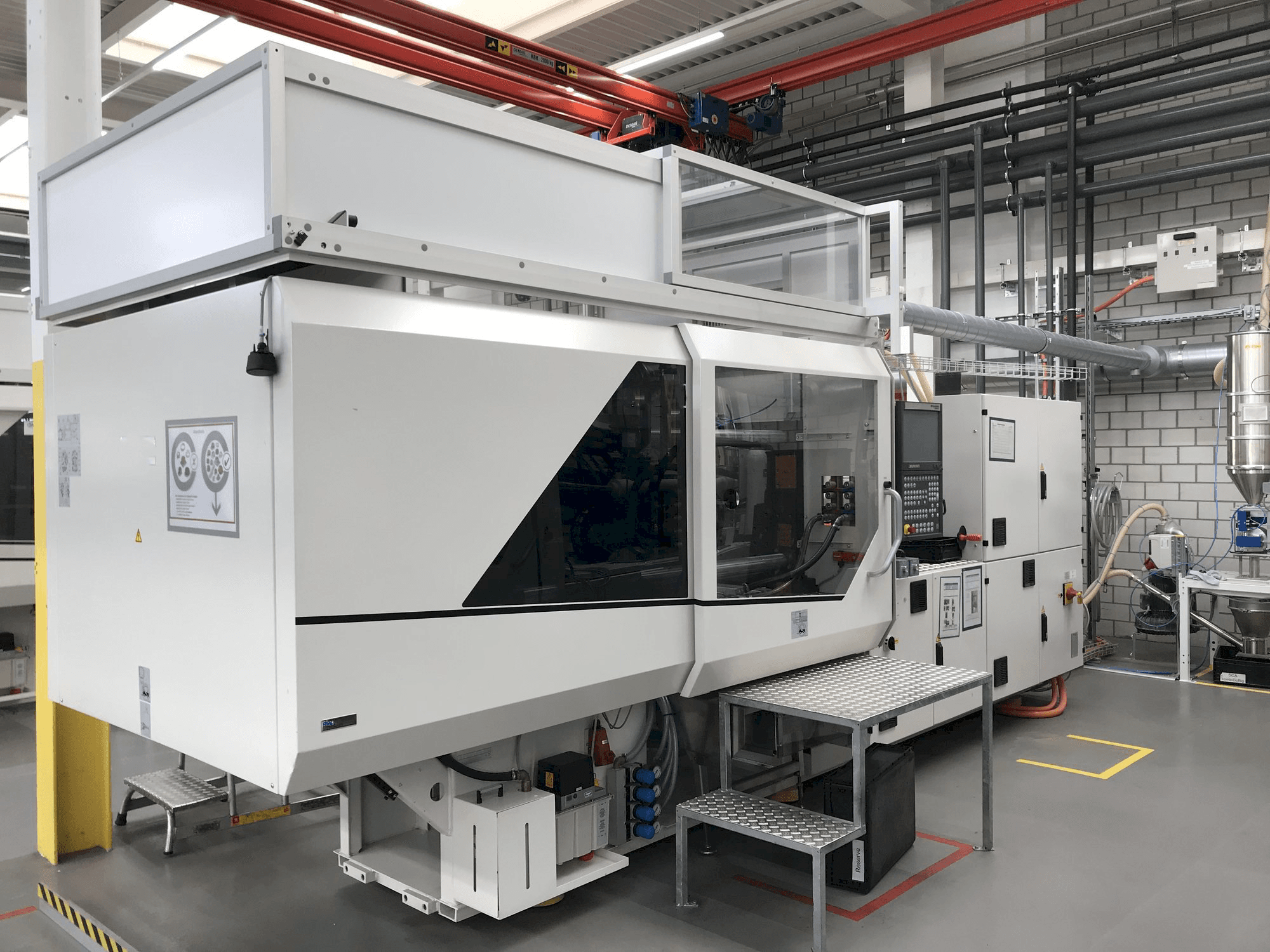 Masina Sumitomo Demag EL-EXIS SP 150/500-475 vasaku külje vaade