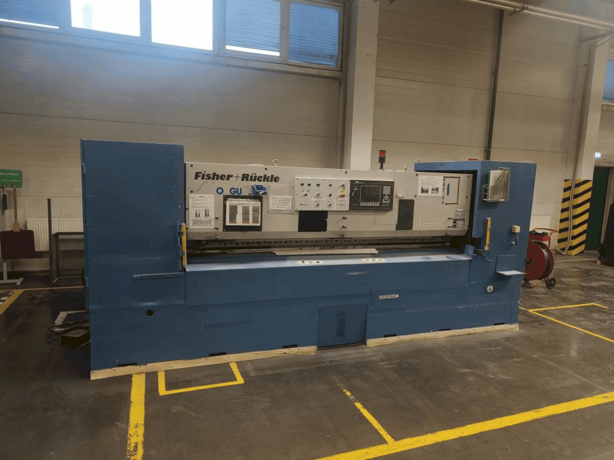 Masina FISCHER & RüCKLE Monguzzi AFD 35 / 2600 eestvaade