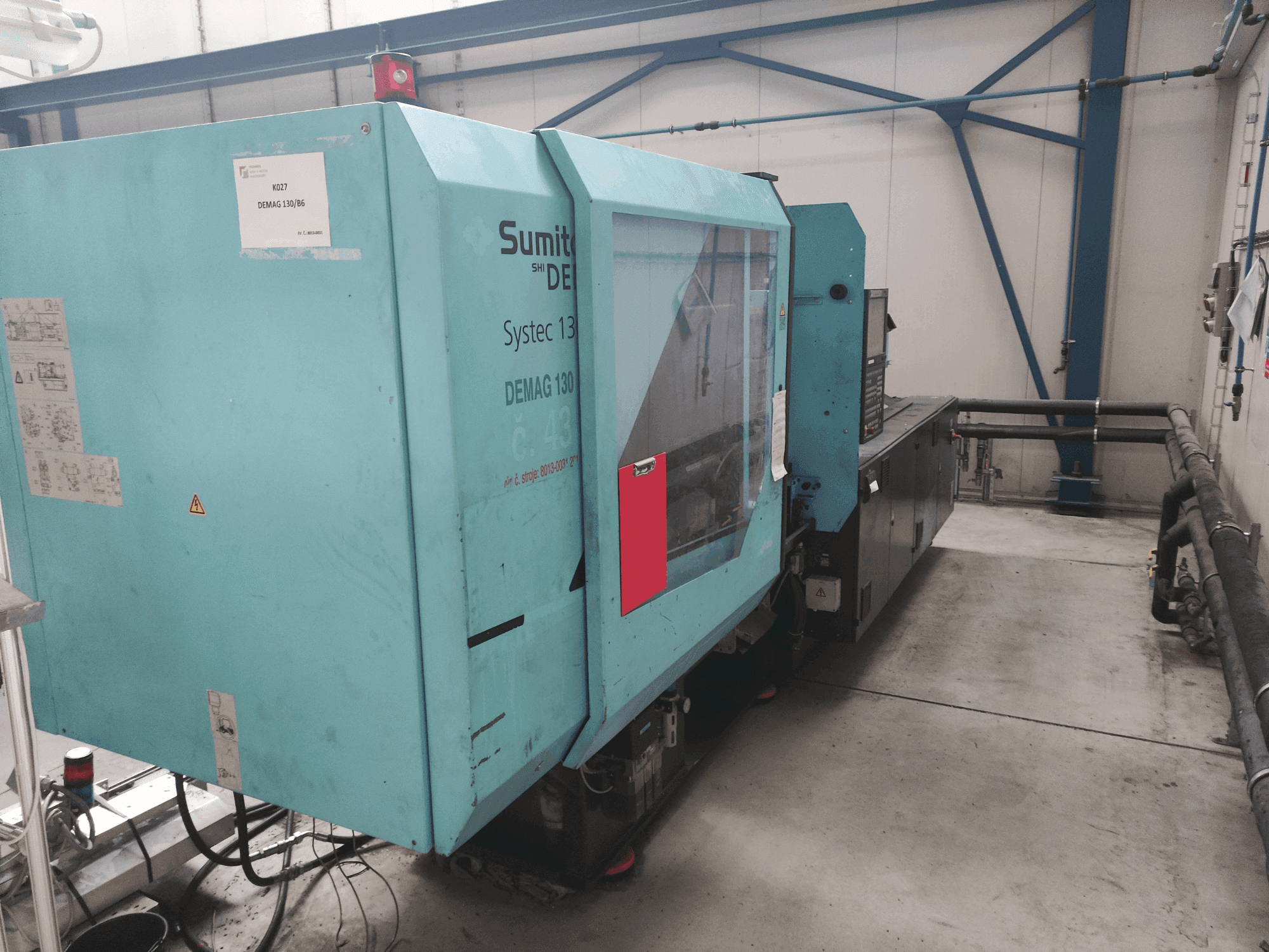 Masina DEMAG Systec 130/475-430 eestvaade