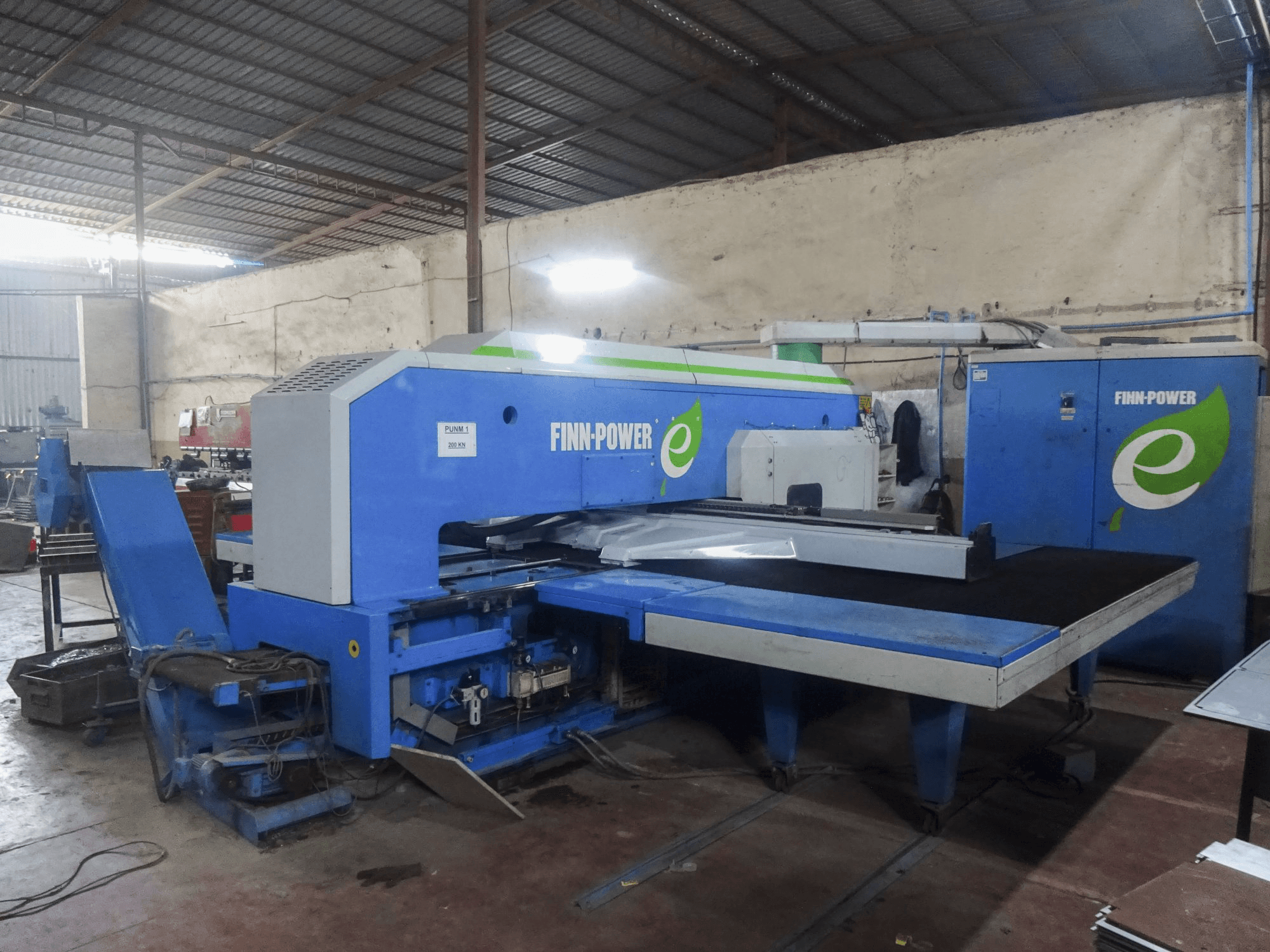 Left view of Finn-Power E5 SBU machine