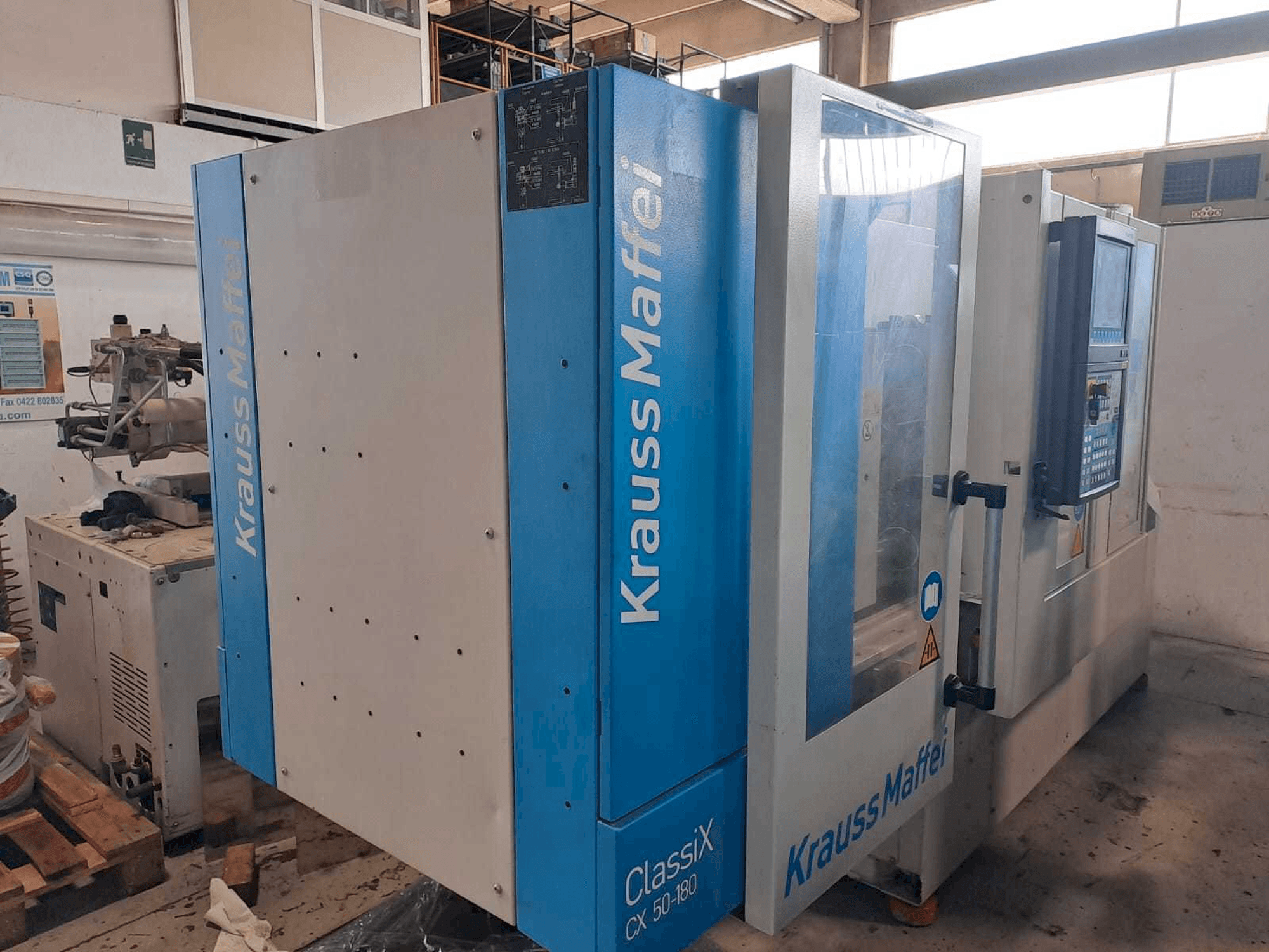 Masinavaade Krauss Maffei 50-180CX vasakult