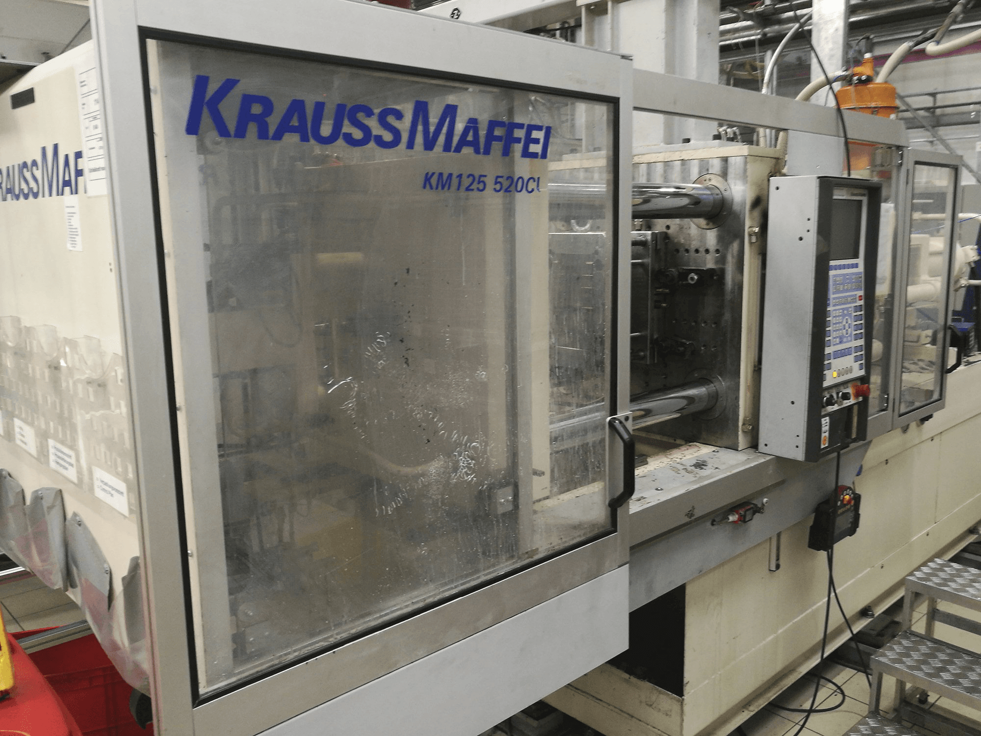 Masina Krauss Maffei KM 125-520 C1 eestvaade