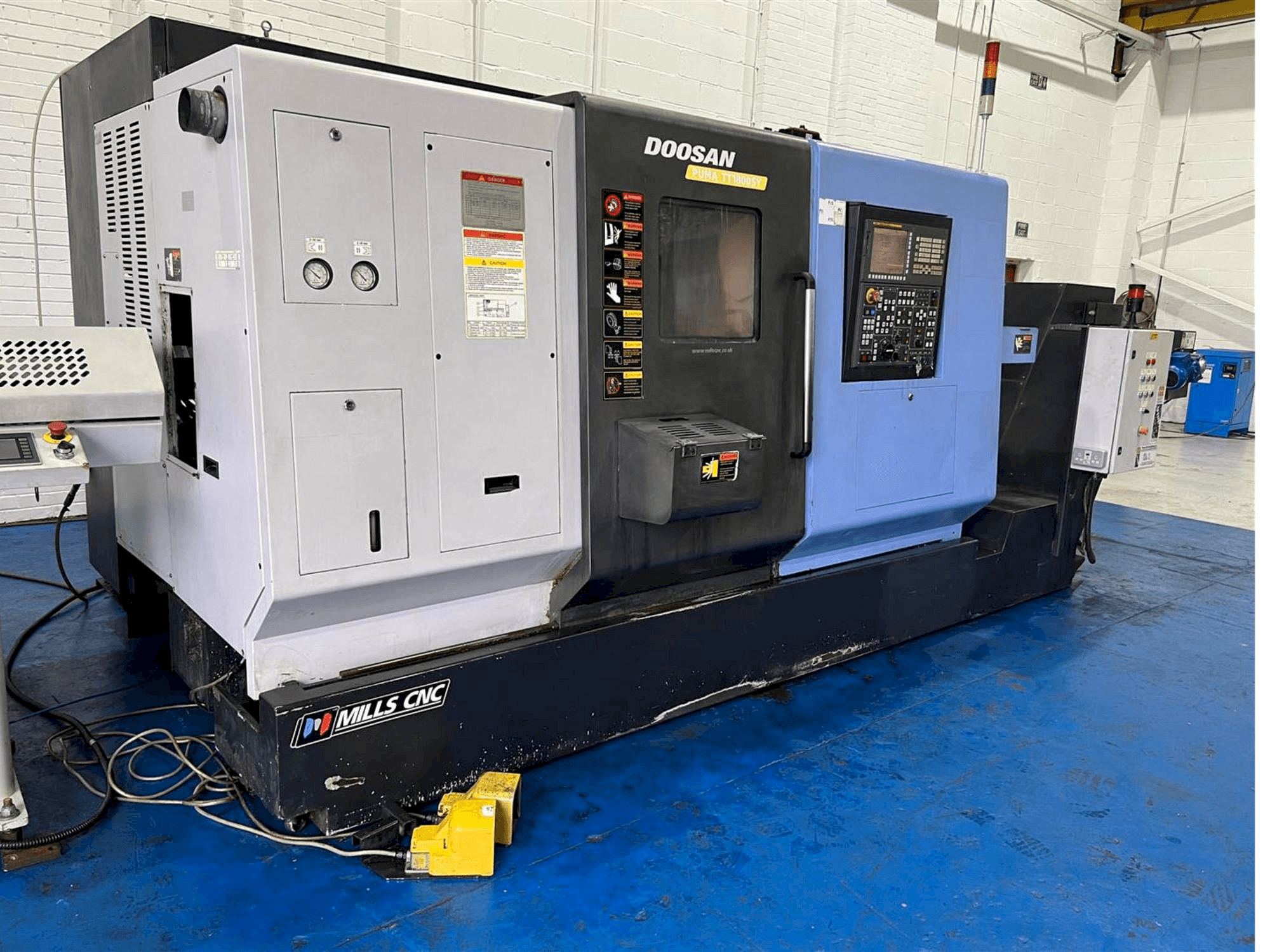 Masina Doosan TT1800SY eestvaade