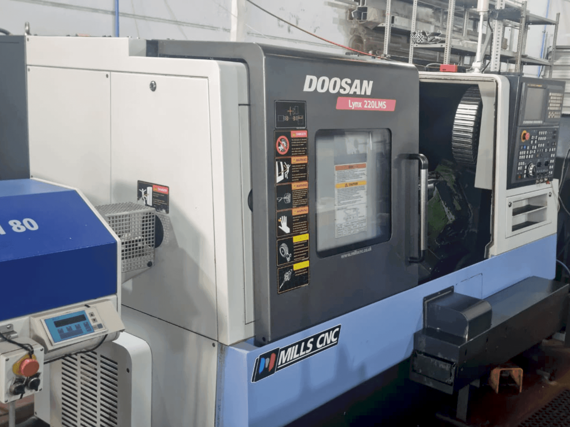 Masina DOOSAN Lynx 220 LMSA eestvaade