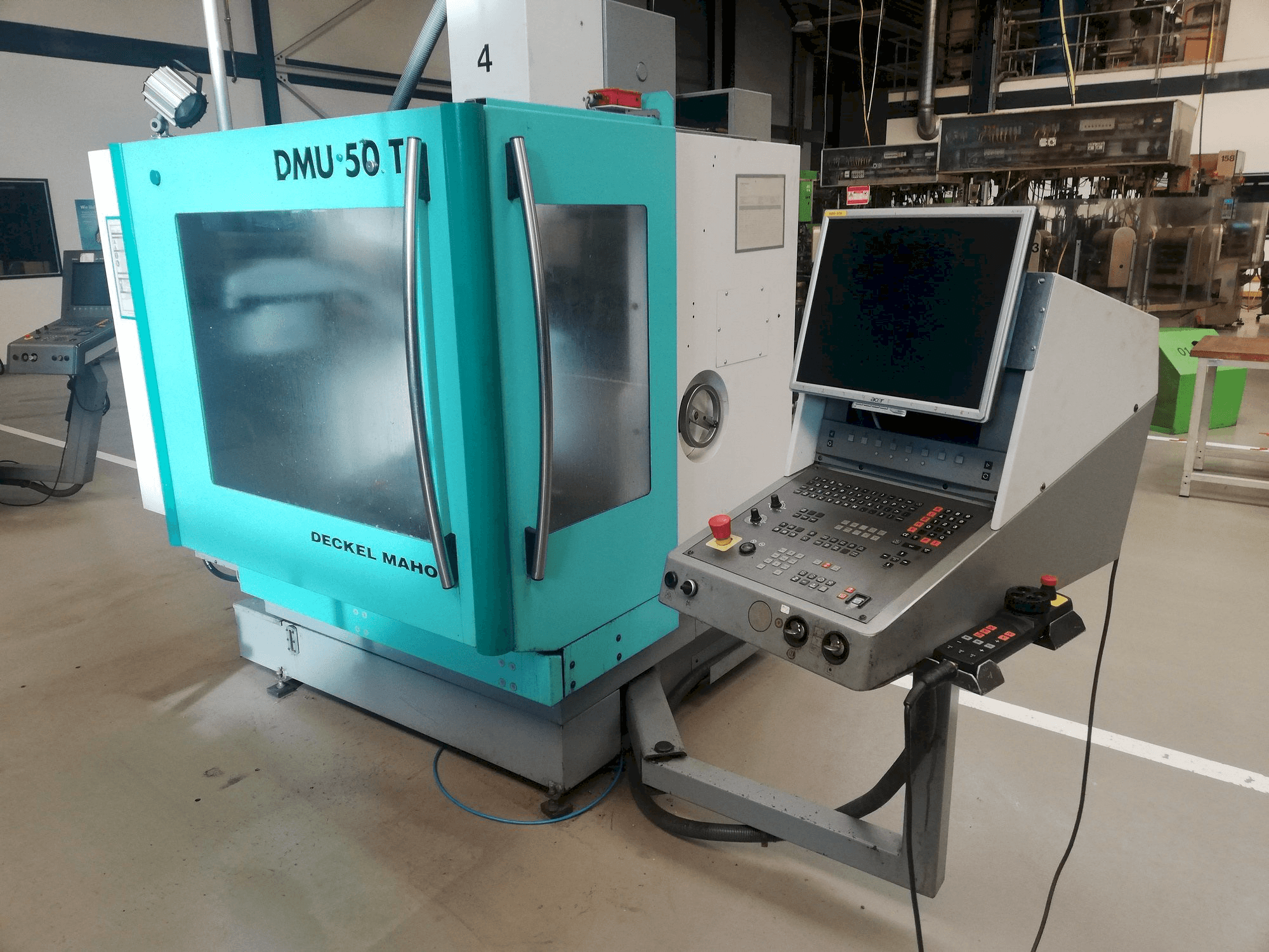 Masina DECKEL MAHO DMU 50T eestvaade