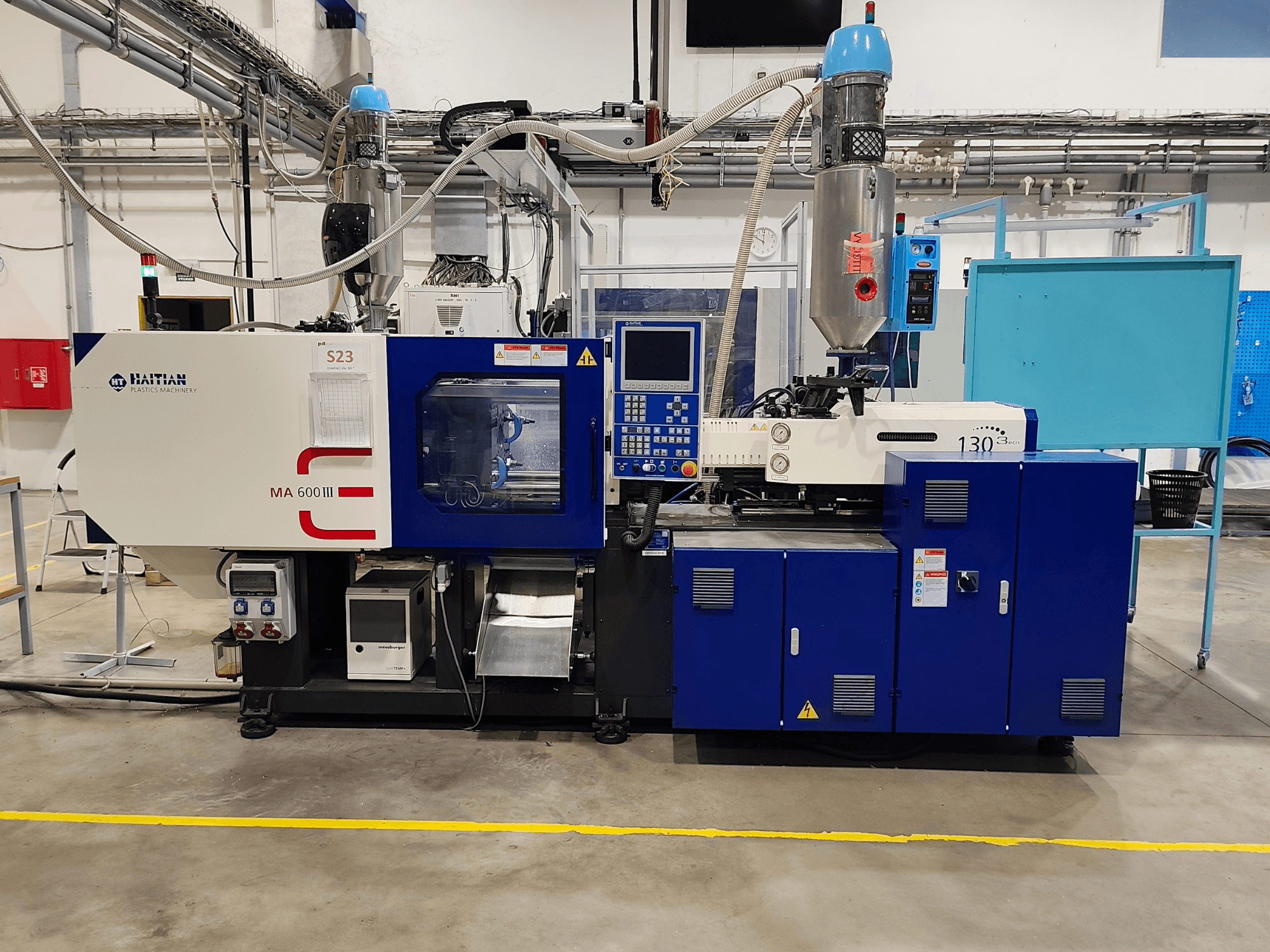 HAITIAN Mars III MA 600/130B eco elektriline süstimisvormimismasin, esivaade, millel on näha juhtpaneel ja süstimisüksus.