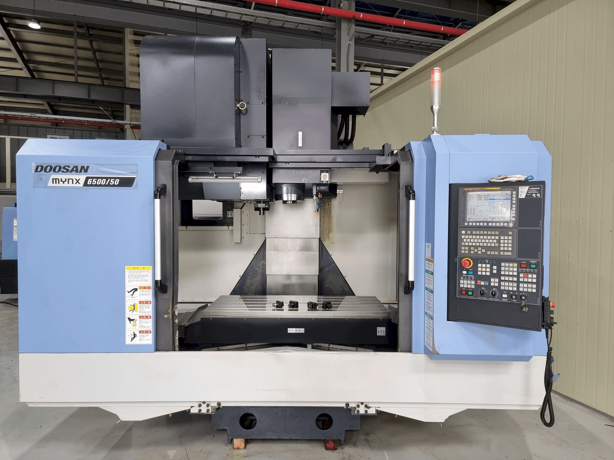 Masina Doosan MYNX 6500/50 eestvaade