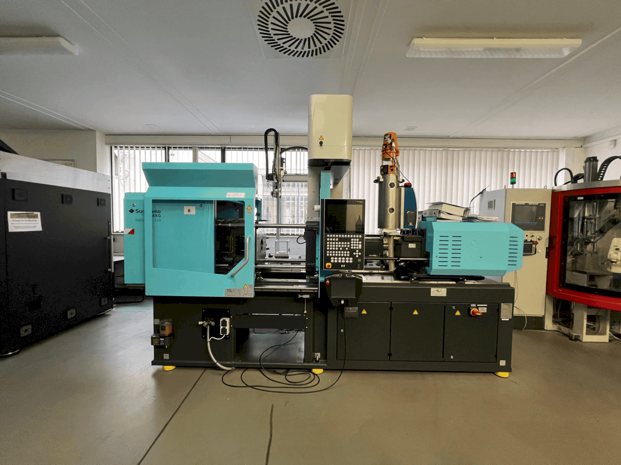 Masina SUMITOMO SHI DEMAG Intelect 2 50/370-110 eestvaade