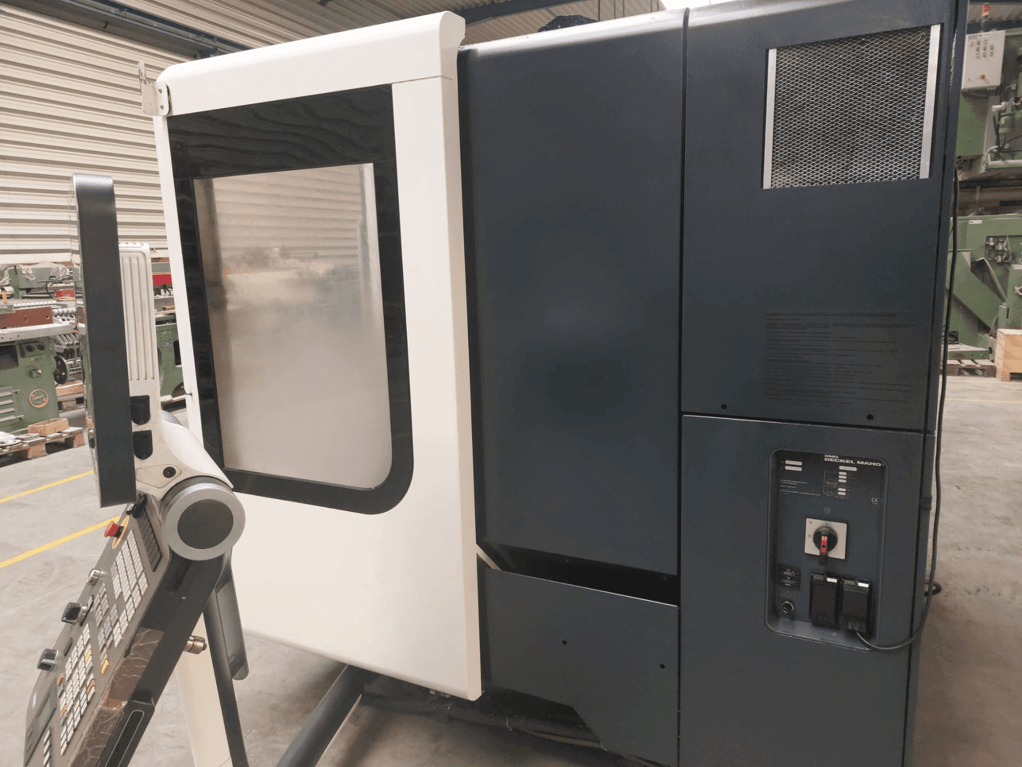Masina DMG DECKEL MAHO DMU 50 eestvaade