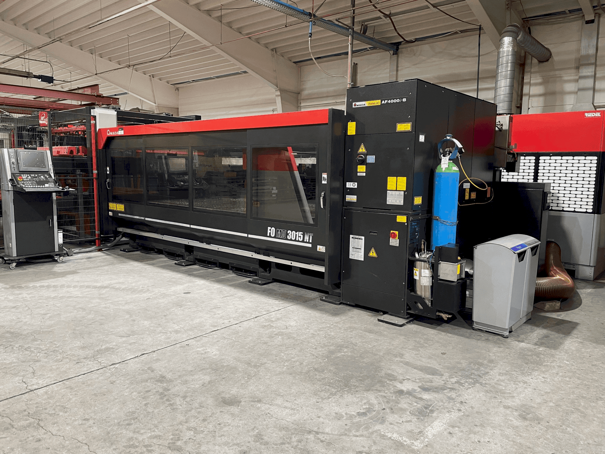 Masina AMADA FOM2 3015 NT eestvaade
