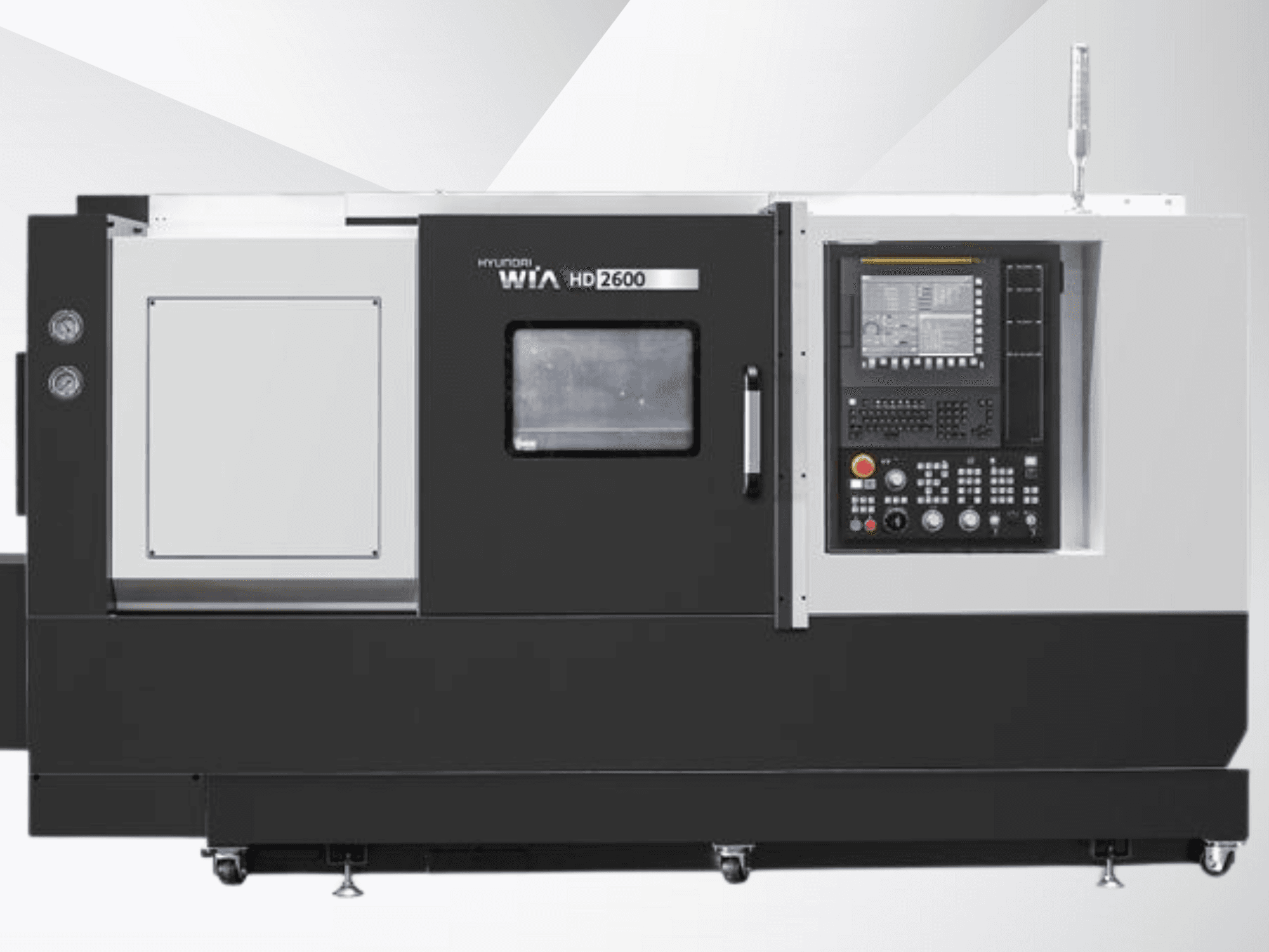Hyundai WIA HD2600 CNC-tööpink, esiplaan, kus on näidatud juhtpaneel koos nuppude, ekraani ja tööriistakambriga.