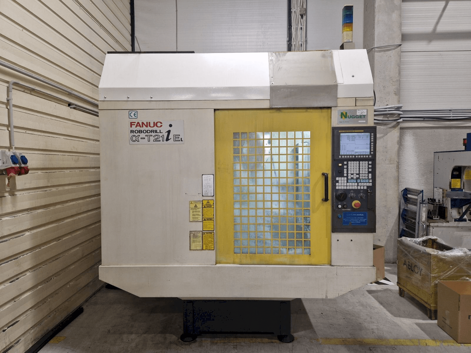 Masina FANUC Robodrill a-T21iEL eestvaade